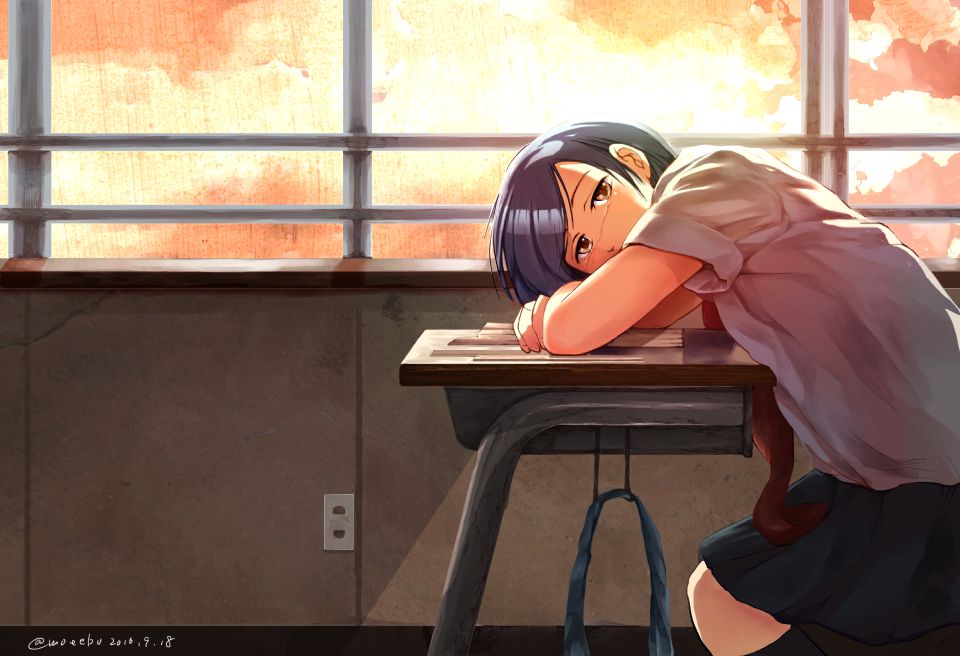 夕焼けにたたずむ教室の少女
