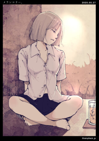 女性が座って物思いにふける。