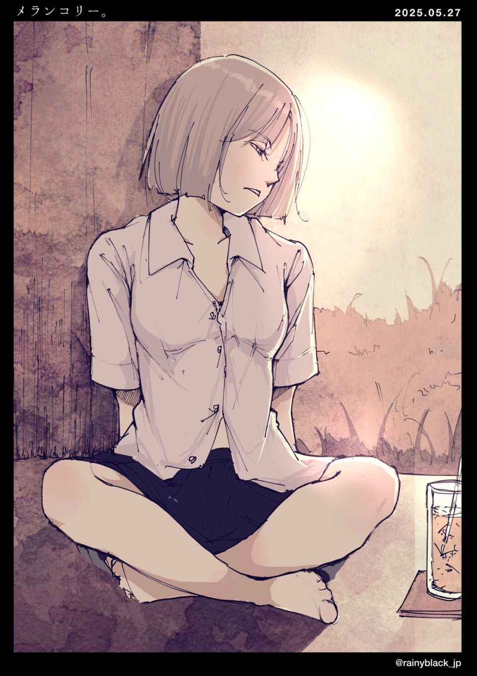 女性が座って物思いにふける。