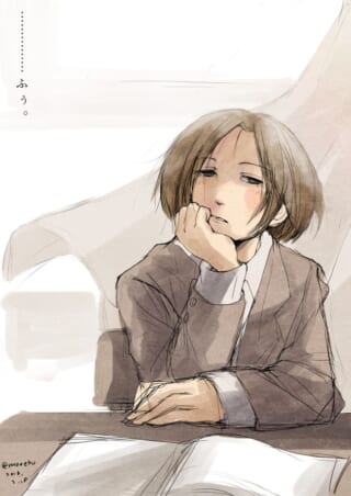 机で疲れた表情の人物