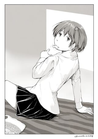 お菓子を食べる女子学生。