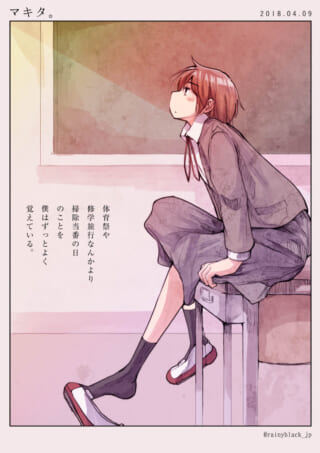 机に座る学生が外を見上げる。