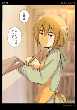 料理をするエプロン姿の少年