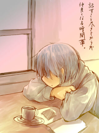 眠る少女とコーヒーカップ