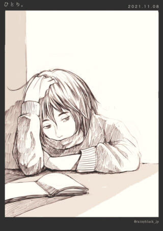 つらそうに机に向かう少女