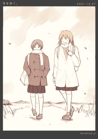 冬の道を歩く女子学生二人