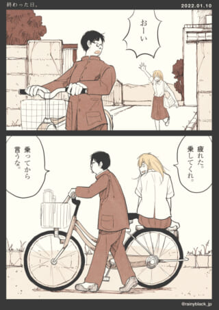 自転車に乗る二人の学生。