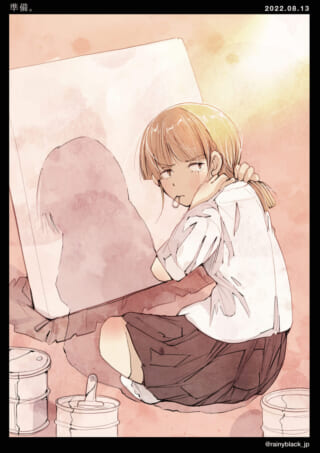 絵を前に座る少女。