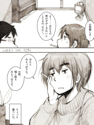 室内で男の子が会話しているシーン。
